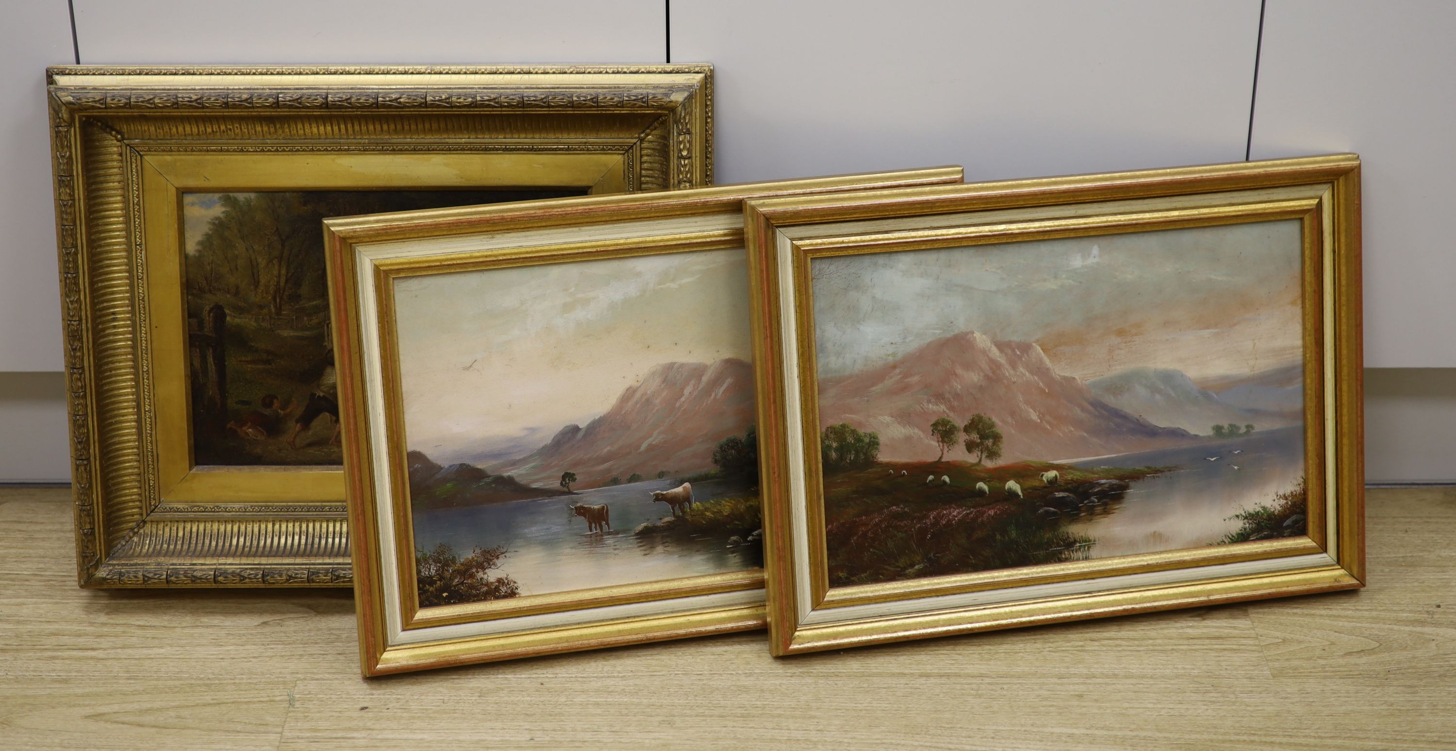 19th century English School, oil on canvas, Children playing on a five bar gate, indistinctly signed and a pair of oils on board, Highland lake landscapes with cattle and sheep grazing